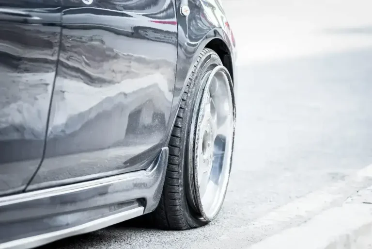 Flat tire on a parked car