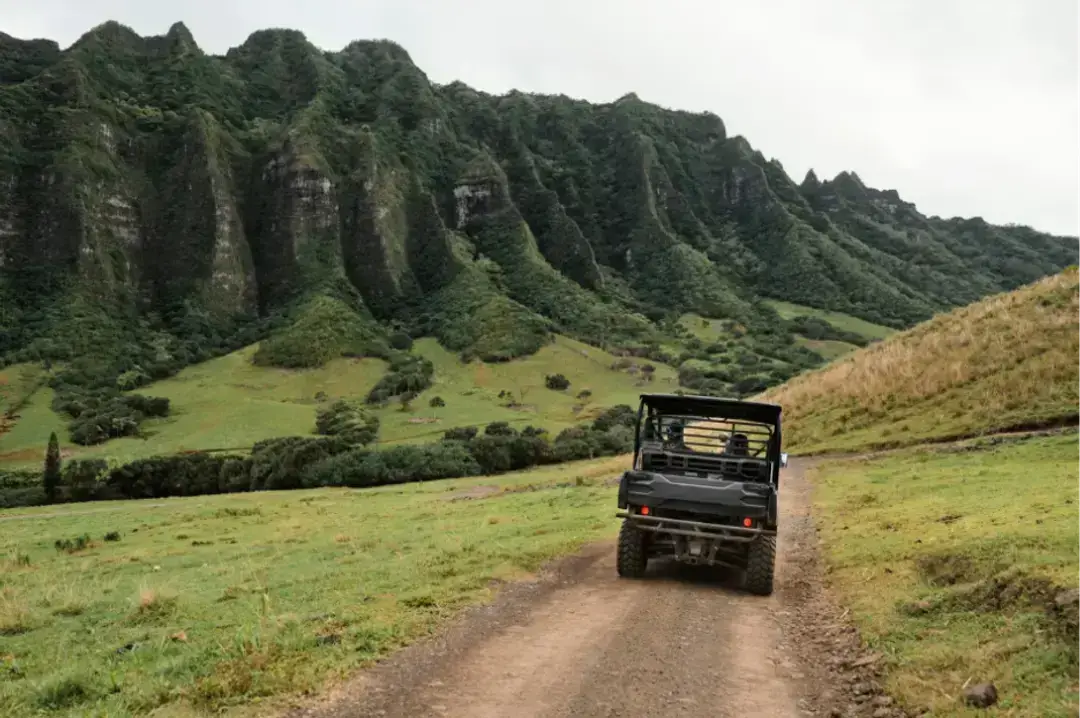 Off-road vehicle on mountain dirt road