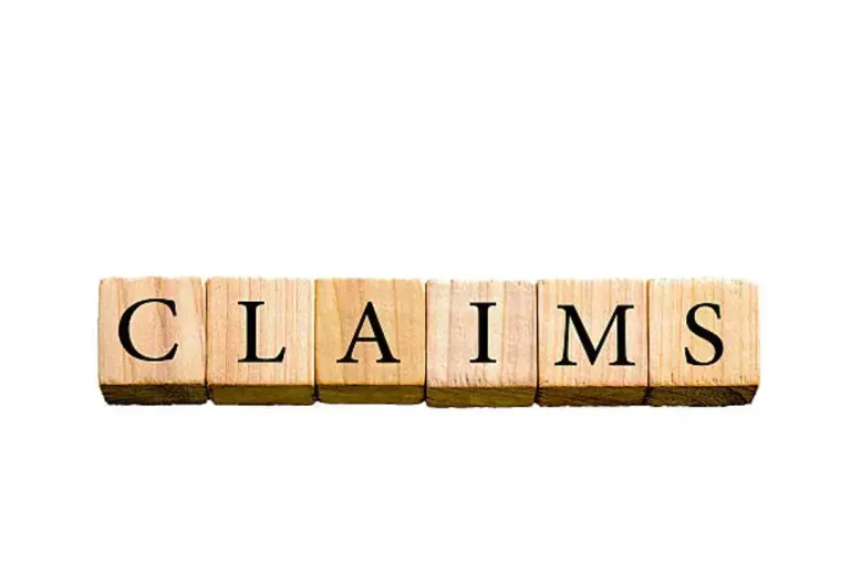 Word CLAIMS isolated on white background with copy space Word CLAIMS. Wooden small cubes with letters isolated on white background with copy space available. Concept image. claims wording stock pictures, royalty-free photos & images