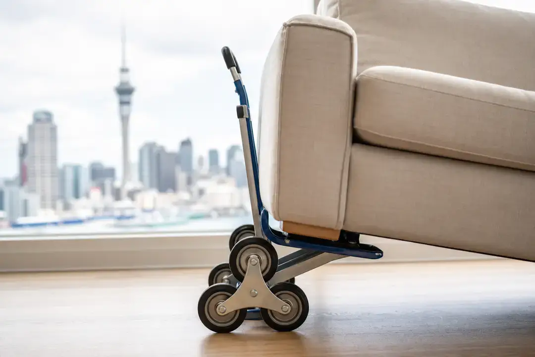 Sofa on stair-climbing dolly