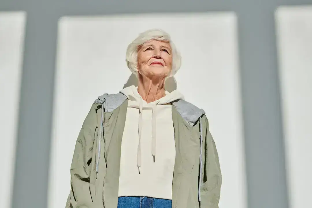 Smiling older woman in casual jacket